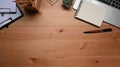 Laptop computer, notepad, pen anÃ Â¸Â succulent plant on wooden table. Royalty Free Stock Photo